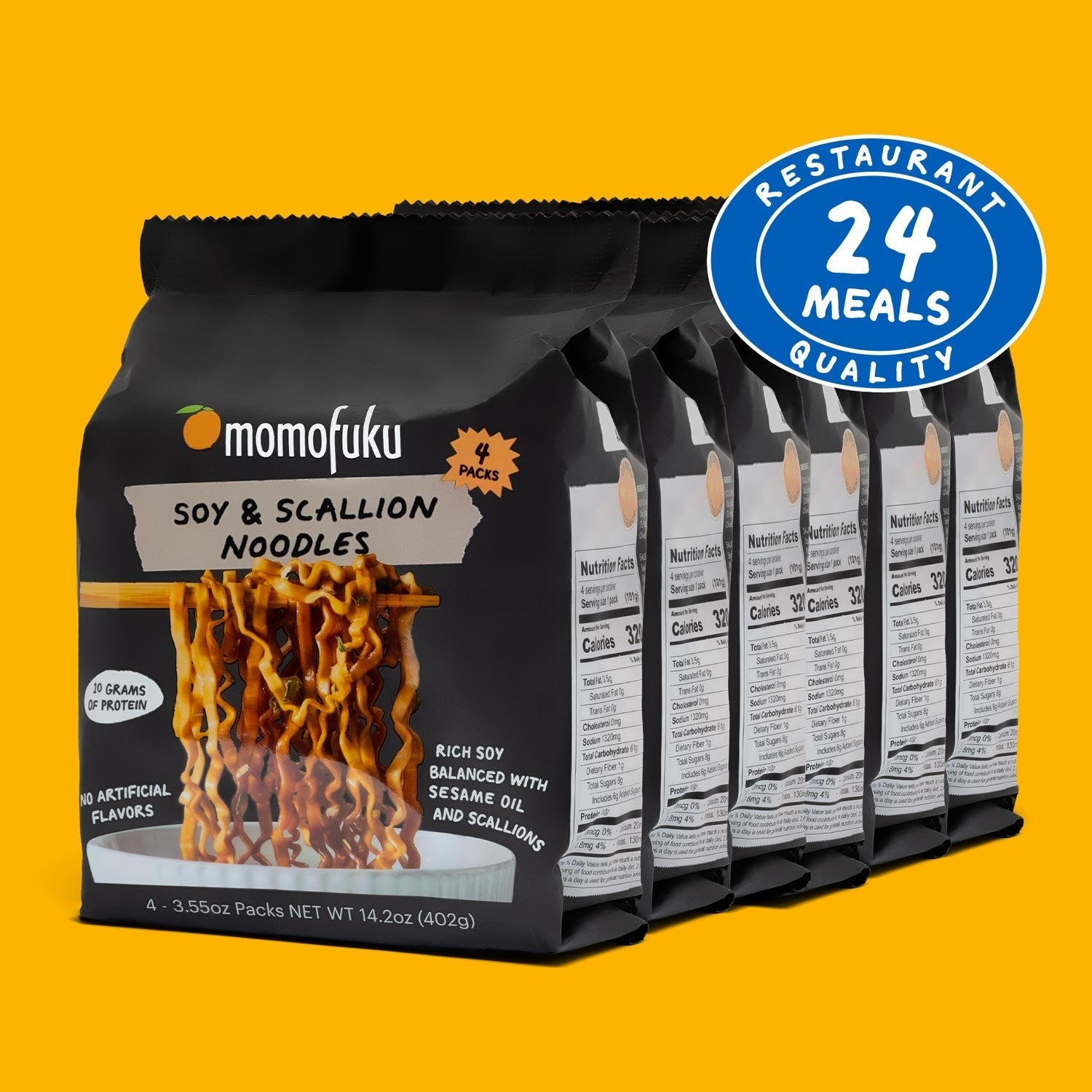 Packaging of Momofuku Soy & Scallion Noodles with a '24 Meals Quality' badge on an orange background.