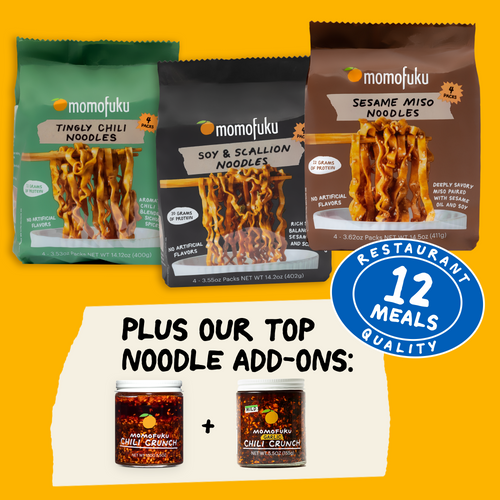 Momofuku noodles packages with top noodle add-ons on a yellow background