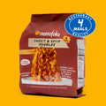 Momofuku Sweet & Spicy Noodles package on a yellow background with a '4 Meals Quality' badge.