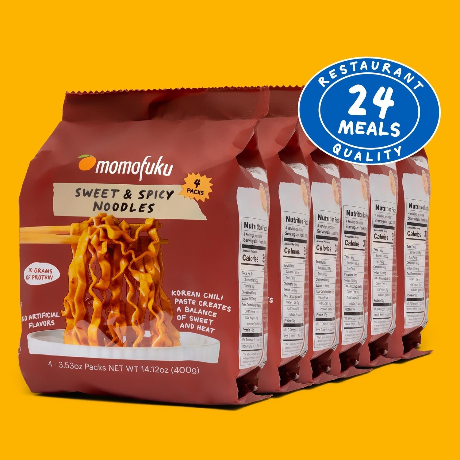 Packaging of Momofuku Sweet & Spicy Noodles with a label indicating 24 meals quality on a yellow background.