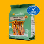 Momofuku Tingly Chili Noodles packaging on a yellow background with a '4 Meals Quality' badge.