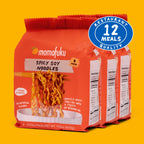 Packaging of Momofuku Spicy Soy Noodles with a label indicating 12 meals quality on a yellow background.